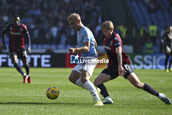 2024-02-18 - Gustav Isaksen of S.S. Lazio and Victor Kristiansen of Bologna F.C. during the 25th day of the Serie A Championship between S.S. Lazio vs Bologna F.C. 1909, 18 February 2024 at the Olympic Stadium in Rome. - SS LAZIO VS BOLOGNA FC - ITALIAN SERIE A - SOCCER