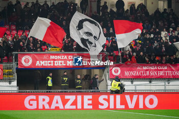 2024-02-18 - Choreography of AC Monza supporters with Silvio Berlusconi flag and write 