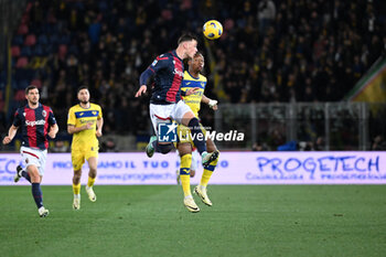 2024-02-23 - Sam Beukema (Bologna Fc) head kick - BOLOGNA FC VS HELLAS VERONA FC - ITALIAN SERIE A - SOCCER