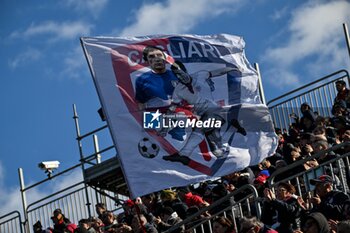 2024-02-25 - Tifosi, Fans, Supporters of Cagliari Calcio, GiGi Riva Flag - CAGLIARI CALCIO VS SSC NAPOLI - ITALIAN SERIE A - SOCCER