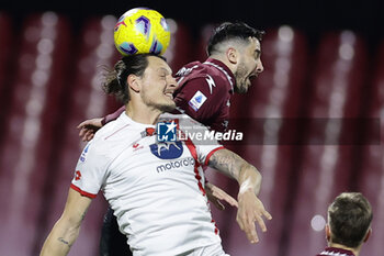 2024-02-24 - Monza’s forward Milan Djuric challenges for the ball with Salernitana's Greek defender Kostas Manolas during the Serie A football match between Unione Sportiva Salernitana vs Monza at the Arechi Stadium in Salerno on February 24, 2024. - US SALERNITANA VS AC MONZA - ITALIAN SERIE A - SOCCER