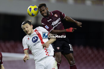 2024-02-24 - Monza’s forward Milan Djuric challenges for the ball with Salernitana's Malian midfielder Lassana Coulibaly during the Serie A football match between Unione Sportiva Salernitana vs Monza at the Arechi Stadium in Salerno on February 24, 2024. - US SALERNITANA VS AC MONZA - ITALIAN SERIE A - SOCCER