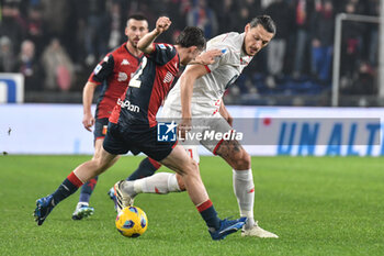 2024-03-09 - Morten Frendrup of Genoa contrast Valentin Carboni of AC Monza during Italian Serie A TIM match between Genoa CFC and AC Monza at Stadio Luigi Ferraris, Genova - GENOA CFC VS AC MONZA - ITALIAN SERIE A - SOCCER