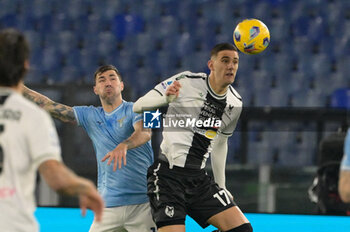 2024-03-11 - Lorenzo Lucca (Udinese Calcio); Alessio Romagnoli (SS Lazio);  during the Italian Football Championship League A 2023/2024 match between SS Lazio vs Udinese Calcio  at the Olimpic Stadium in Rome on 11 March 2024. - SS LAZIO VS UDINESE CALCIO - ITALIAN SERIE A - SOCCER