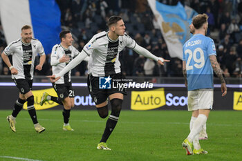 2024-03-11 - Lorenzo Lucca (Udinese Calcio); celebrates after scoring the goal 0-1 during the Italian Football Championship League A 2023/2024 match between SS Lazio vs Udinese Calcio  at the Olimpic Stadium in Rome on 11 March 2024. - SS LAZIO VS UDINESE CALCIO - ITALIAN SERIE A - SOCCER