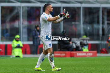2024-03-10 - Elia Caprile of Empoli FC gestures during Serie A 2023/24 football match between AC Milan and Empoli FC at San Siro Stadium, Milan, Italy on March 10, 2024 - AC MILAN VS EMPOLI FC - ITALIAN SERIE A - SOCCER