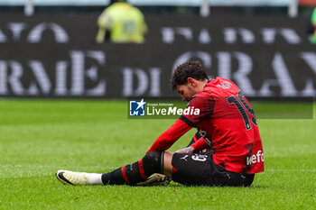 2024-03-10 - Theo Hernandez of AC Milan injured during Serie A 2023/24 football match between AC Milan and Empoli FC at San Siro Stadium, Milan, Italy on March 10, 2024 - AC MILAN VS EMPOLI FC - ITALIAN SERIE A - SOCCER