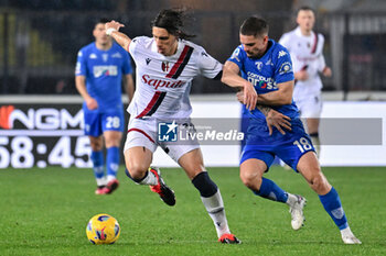 2024-03-15 - Bologna FC's defender Riccardo Calafiori against Empoli FC's midfielder Razvan Marin - EMPOLI FC VS BOLOGNA FC - ITALIAN SERIE A - SOCCER