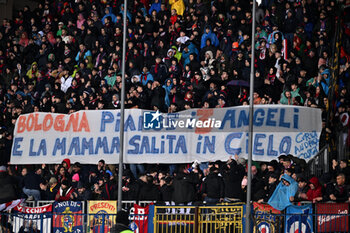 2024-03-15 - Bologna FC's supporters with a banner for the tragedy of a woman and her three children who died in a fire in their flat in Bologna - EMPOLI FC VS BOLOGNA FC - ITALIAN SERIE A - SOCCER