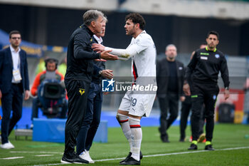 2024-03-17 - Hellas Verona's Head Coach Marco Baroni protests with Milan's Theo Hernandez for his celebrating of the goal - HELLAS VERONA FC VS AC MILAN - ITALIAN SERIE A - SOCCER