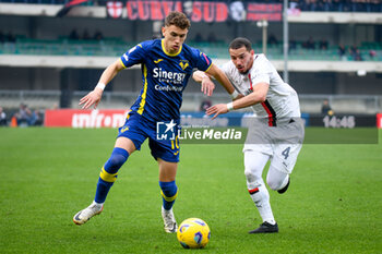 2024-03-17 - Verona's Stefan Mitrovic in action against Milan's Ismael Bennacer - HELLAS VERONA FC VS AC MILAN - ITALIAN SERIE A - SOCCER
