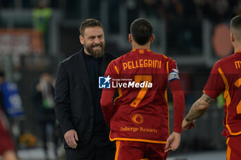 2024-03-17 - Lorenzo Pellegrini (AS Roma); and Daniele De Rossi coach of AS Roma; celebrates after scoring the goal 1-0 during the Italian Football Championship League A 2023/2024 match between AS Roma vs US Sassuolo at the Olimpic Stadium in Rome on 17 March  2024. - AS ROMA VS US SASSUOLO - ITALIAN SERIE A - SOCCER