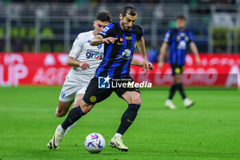 2024-04-01 - Henrikh Mkhitaryan of FC Internazionale seen in action during Serie A 2023/24 football match between FC Internazionale and Empoli FC at Giuseppe Meazza Stadium, Milan, Italy on April 01, 2024 - INTER - FC INTERNAZIONALE VS EMPOLI FC - ITALIAN SERIE A - SOCCER