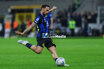 2024-04-01 - Hakan Calhanoglu of FC Internazionale seen in action during Serie A 2023/24 football match between FC Internazionale and Empoli FC at Giuseppe Meazza Stadium, Milan, Italy on April 01, 2024 - INTER - FC INTERNAZIONALE VS EMPOLI FC - ITALIAN SERIE A - SOCCER