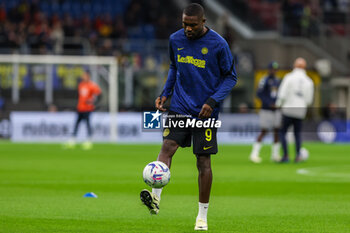 2024-04-01 - Marcus Thuram of FC Internazionale warms up during Serie A 2023/24 football match between FC Internazionale and Empoli FC at Giuseppe Meazza Stadium, Milan, Italy on April 01, 2024 - INTER - FC INTERNAZIONALE VS EMPOLI FC - ITALIAN SERIE A - SOCCER