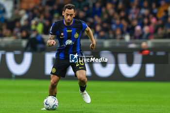 2024-04-01 - Hakan Calhanoglu of FC Internazionale seen in action during Serie A 2023/24 football match between FC Internazionale and Empoli FC at Giuseppe Meazza Stadium, Milan, Italy on April 01, 2024 - INTER - FC INTERNAZIONALE VS EMPOLI FC - ITALIAN SERIE A - SOCCER