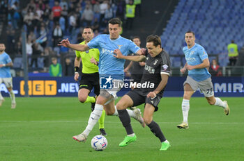 2024-03-30 - Lazio’s Nicolo Casale Juventus' Federico Chiesa  during the Italian Football Championship League A 2023/2024 match between SS Lazio vs Juventus FC at the Olimpic Stadium in Rome on 30 March 2024. - SS LAZIO VS JUVENTUS FC - ITALIAN SERIE A - SOCCER