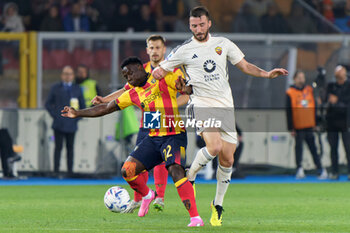 2024-04-01 - Lameck Banda of US Lecce in action against Leandro Paredes of AS Roma - US LECCE VS AS ROMA - ITALIAN SERIE A - SOCCER