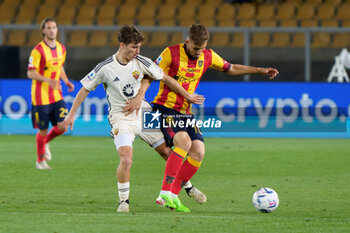 2024-04-01 - Tommaso Baldanzi of AS Roma in action against Remi Oudin of US Lecce - US LECCE VS AS ROMA - ITALIAN SERIE A - SOCCER