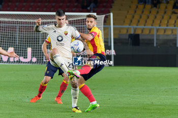 2024-04-01 - Gianluca Mancini of AS Roma in action against Remi Oudin of US Lecce - US LECCE VS AS ROMA - ITALIAN SERIE A - SOCCER