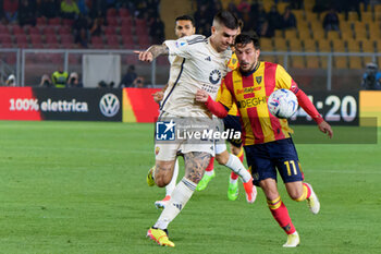 2024-04-01 - Gianluca Mancini of AS Roma in action against Nicola Sansone of US Lecce - US LECCE VS AS ROMA - ITALIAN SERIE A - SOCCER