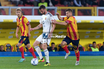 2024-04-01 - Bryan Cristante of AS Roma and Ylber Ramadani of US Lecce - US LECCE VS AS ROMA - ITALIAN SERIE A - SOCCER