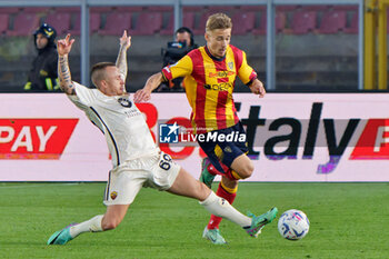 2024-04-01 - Pontus Almqvist of US Lecce in action against Jose Angel Esmoris Tasende Angelino of AS Roma - US LECCE VS AS ROMA - ITALIAN SERIE A - SOCCER