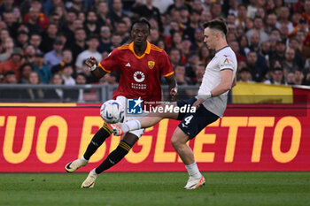 2024-04-06 - Tammy Abraham of A.S. Roma and Patric of S.S. Lazio during the 31th day of the Serie A Championship between A.S. Roma vs S.S. Lazio, 6 April, 2024 at the Olympic Stadium in Rome, Italy. - AS ROMA VS SS LAZIO - ITALIAN SERIE A - SOCCER