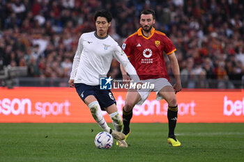 2024-04-06 - Daichi Kamada of S.S. Lazio and Bryan Cristante of A.S. Roma during the 31th day of the Serie A Championship between A.S. Roma vs S.S. Lazio, 6 April, 2024 at the Olympic Stadium in Rome, Italy. - AS ROMA VS SS LAZIO - ITALIAN SERIE A - SOCCER