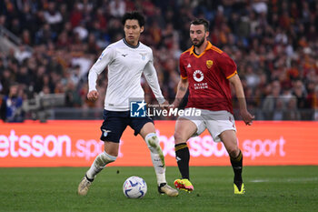 2024-04-06 - Daichi Kamada of S.S. Lazio and Bryan Cristante of A.S. Roma during the 31th day of the Serie A Championship between A.S. Roma vs S.S. Lazio, 6 April, 2024 at the Olympic Stadium in Rome, Italy. - AS ROMA VS SS LAZIO - ITALIAN SERIE A - SOCCER