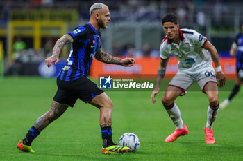 2024-04-14 - Federico Dimarco of FC Internazionale seen in action during Serie A 2023/24 football match between FC Internazionale and Cagliari Calcio at Giuseppe Meazza Stadium, Milan, Italy on April 14, 2024 - INTER - FC INTERNAZIONALE VS CAGLIARI CALCIO - ITALIAN SERIE A - SOCCER