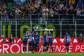 2024-04-14 - Marcus Thuram of FC Internazionale celebrates with his teammates after scoring a goal during Serie A 2023/24 football match between FC Internazionale and Cagliari Calcio at Giuseppe Meazza Stadium, Milan, Italy on April 14, 2024 - INTER - FC INTERNAZIONALE VS CAGLIARI CALCIO - ITALIAN SERIE A - SOCCER