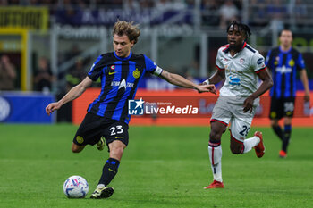 2024-04-14 - Nicolo Barella of FC Internazionale seen in action during Serie A 2023/24 football match between FC Internazionale and Cagliari Calcio at Giuseppe Meazza Stadium, Milan, Italy on April 14, 2024 - INTER - FC INTERNAZIONALE VS CAGLIARI CALCIO - ITALIAN SERIE A - SOCCER