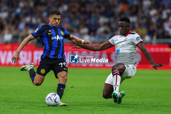 2024-04-14 - Alexis Sanchez of FC Internazionale seen in action during Serie A 2023/24 football match between FC Internazionale and Cagliari Calcio at Giuseppe Meazza Stadium, Milan, Italy on April 14, 2024 - INTER - FC INTERNAZIONALE VS CAGLIARI CALCIO - ITALIAN SERIE A - SOCCER