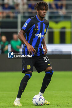 2024-04-14 - Yann Aurel Ludger Bissek of FC Internazionale seen in action during Serie A 2023/24 football match between FC Internazionale and Cagliari Calcio at Giuseppe Meazza Stadium, Milan, Italy on April 14, 2024 - INTER - FC INTERNAZIONALE VS CAGLIARI CALCIO - ITALIAN SERIE A - SOCCER