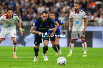 2024-04-14 - Hakan Calhanoglu of FC Internazionale kickis penalty during Serie A 2023/24 football match between FC Internazionale and Cagliari Calcio at Giuseppe Meazza Stadium, Milan, Italy on April 14, 2024 - INTER - FC INTERNAZIONALE VS CAGLIARI CALCIO - ITALIAN SERIE A - SOCCER