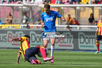 2024-04-13 - Simone Bastoni of Empoli FC in action against Valentin Gendrey of US Lecce - US LECCE VS EMPOLI FC - ITALIAN SERIE A - SOCCER