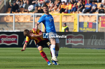 2024-04-13 - Alberto Cerri of Empoli FC in action against Ylber Ramadani of US Lecce - US LECCE VS EMPOLI FC - ITALIAN SERIE A - SOCCER