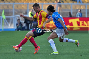 2024-04-13 - Alexis Blin of US Lecce in action against Youssef Maleh of Empoli FC - US LECCE VS EMPOLI FC - ITALIAN SERIE A - SOCCER