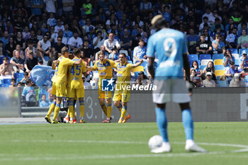2024-04-14 - Frosinone's Moroccan forward Walid Cheddira celebrates after scoring a goal during the Serie A football match between SSC Napoli and Frosinone at the Diego Armando Maradona Stadium in Naples, southern Italy, on April 14, 2024. - SSC NAPOLI VS FROSINONE CALCIO - ITALIAN SERIE A - SOCCER