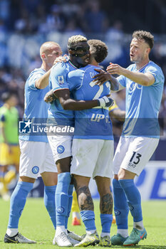2024-04-14 - SSC Napoli's Nigerian forward Victor Osimhen celebrates after scoring a goal during the Serie A football match between SSC Napoli and Frosinone at the Diego Armando Maradona Stadium in Naples, southern Italy, on April 14, 2024. - SSC NAPOLI VS FROSINONE CALCIO - ITALIAN SERIE A - SOCCER