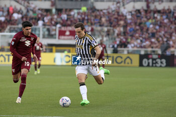 2024-04-13 - Raoul Bellanova (Torino FC) vs Federico Chiesa (Juventus FC) - TORINO FC VS JUVENTUS FC - ITALIAN SERIE A - SOCCER