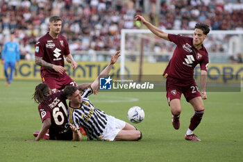 2024-04-13 - Adrien Tameze (Torino FC) and Samuele Ricci (Torino FC) vs Dusan Vlahovic (Juventus FC) - TORINO FC VS JUVENTUS FC - ITALIAN SERIE A - SOCCER
