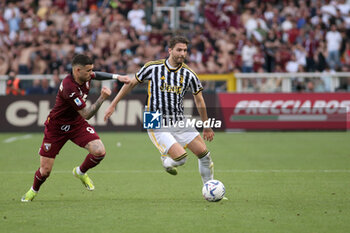 2024-04-13 - Antonio Sanabria (Torino FC) vs Manuel Locatelli (Juventus FC) - TORINO FC VS JUVENTUS FC - ITALIAN SERIE A - SOCCER
