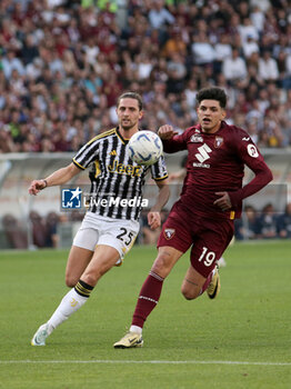 2024-04-13 - Raoul Bellanova (Torino FC) vs Adrien Rabiot (Juventus FC) - TORINO FC VS JUVENTUS FC - ITALIAN SERIE A - SOCCER