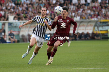 2024-04-13 - Adrien Rabiot (Juventus FC) vs Raoul Bellanova (Torino FC) - TORINO FC VS JUVENTUS FC - ITALIAN SERIE A - SOCCER