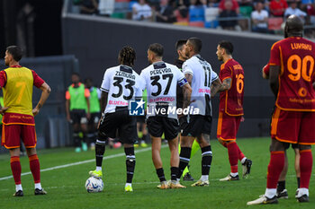 2024-04-14 - Udinese Calcio players worried about Roma's Evan Ndicka - UDINESE CALCIO VS AS ROMA - ITALIAN SERIE A - SOCCER