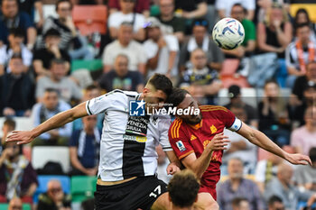 2024-04-14 - Header of Udinese's Lorenzo Lucca and Roma’s Bryan Cristante - UDINESE CALCIO VS AS ROMA - ITALIAN SERIE A - SOCCER