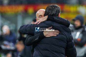 2024-04-22 - Stefano Pioli Head Coach of AC Milan hugs Simone Inzaghi Head Coach of FC Internazionale during Serie A 2023/24 football match between AC Milan and FC Internazionale at San Siro Stadium, Milan, Italy on April 22, 2024 - AC MILAN VS INTER - FC INTERNAZIONALE - ITALIAN SERIE A - SOCCER