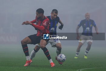 2024-04-22 - Henrikh Mkhitaryan of FC Internazionale competes for the ball with Ruben Loftus-Cheek of AC Milan during Serie A 2023/24 football match between AC Milan and FC Internazionale at San Siro Stadium, Milan, Italy on April 22, 2024 - AC MILAN VS INTER - FC INTERNAZIONALE - ITALIAN SERIE A - SOCCER